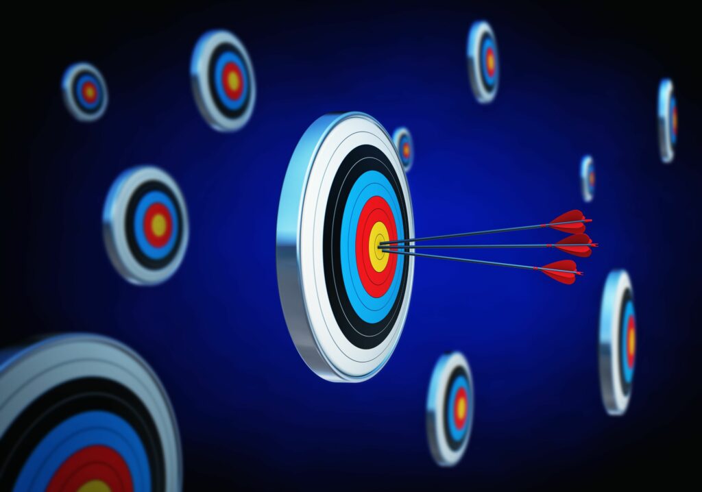 One target with arrows with other targets floating in the air around it